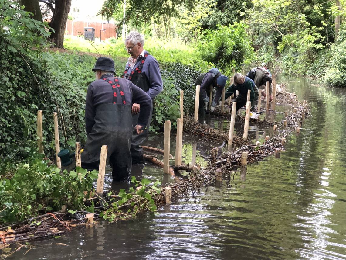 The Friends of the Westbrook & Stonebridge Pond - volunteers in the stream 
