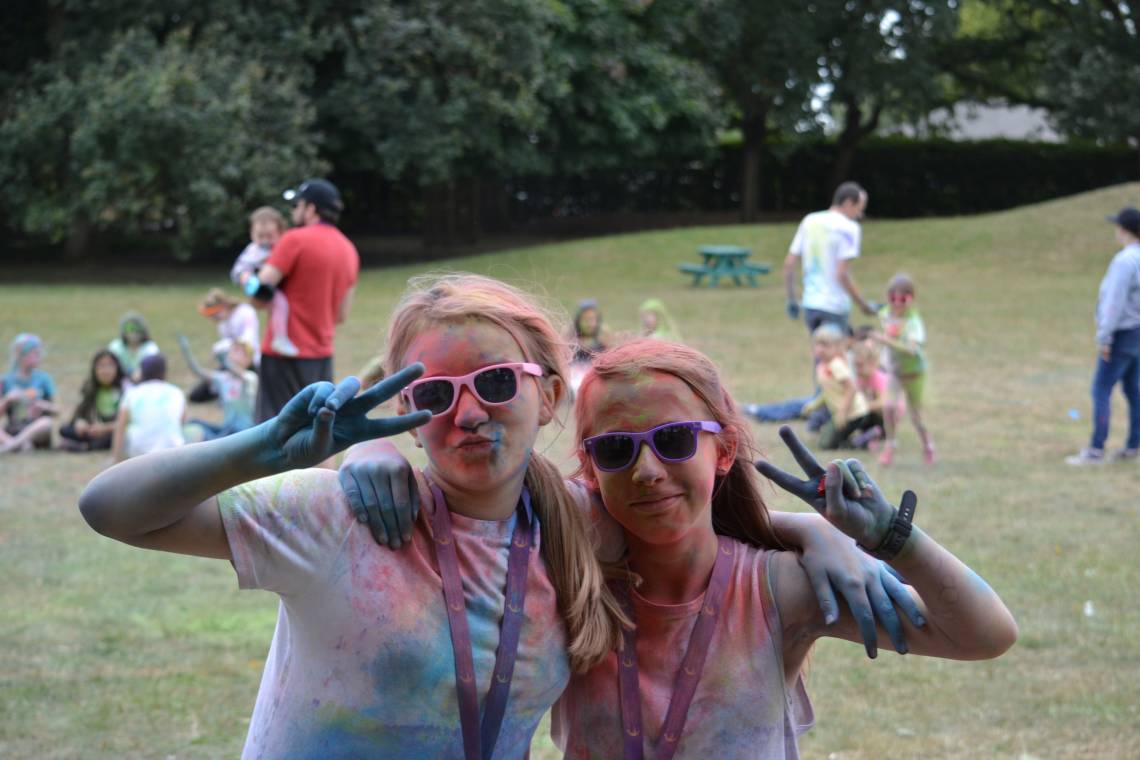 Celebration Church - two girls covered in paint