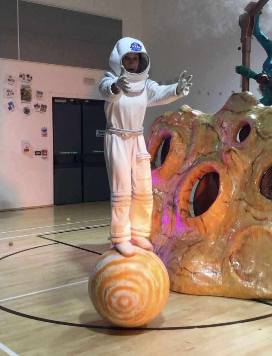 Over the Moon theatre performance - an astronaut on a planet