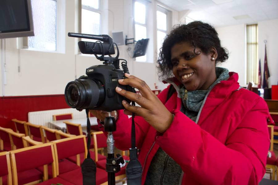 Music Man Project - woman taking a photo
