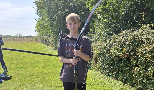 Young carer with archery bow