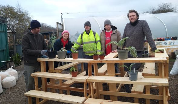 Participants with their plant shelving