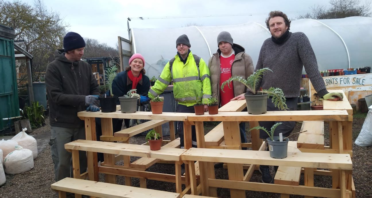 Participants showing their plant shelves